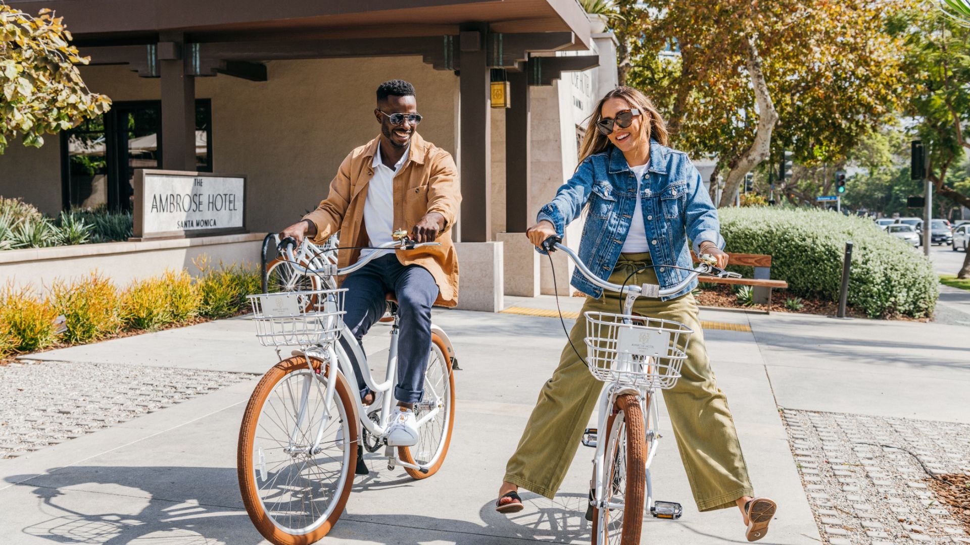 A Man And Woman Riding Bikes